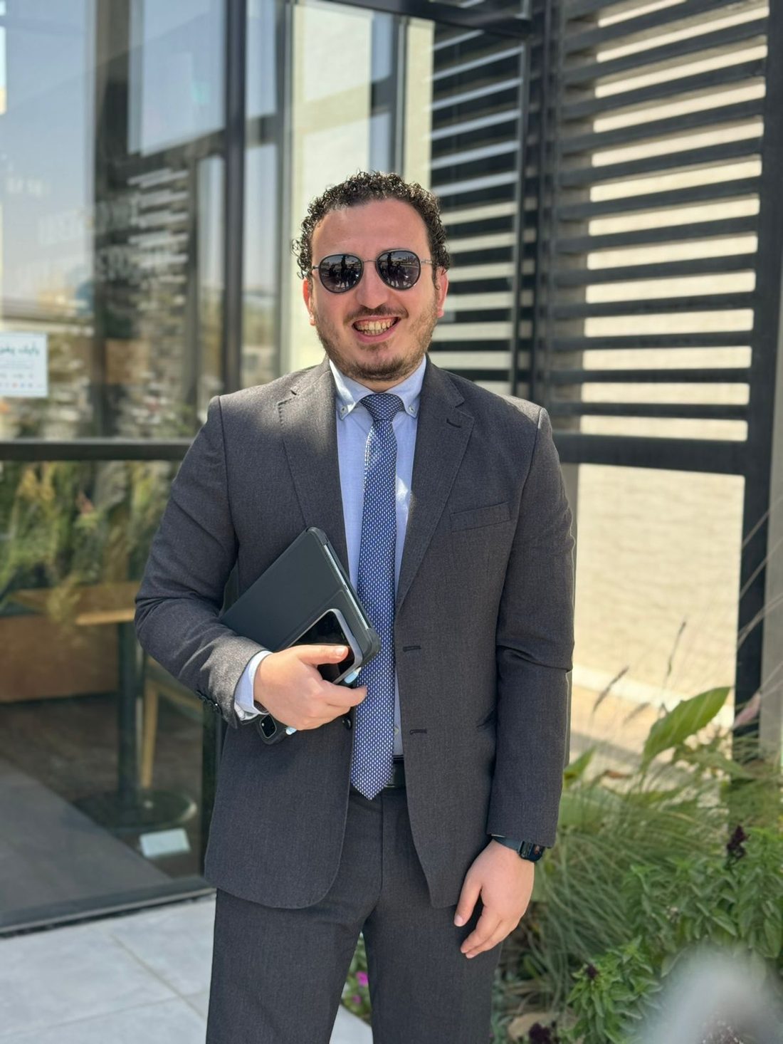 Ahmed Assem at a client business meeting